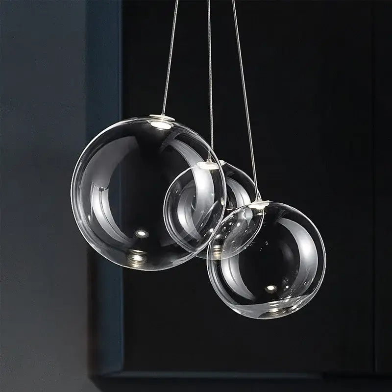 Modern chrome glass ball pendant light featuring clear spherical glass pendant light ideal for dining room decorbites glass ball
