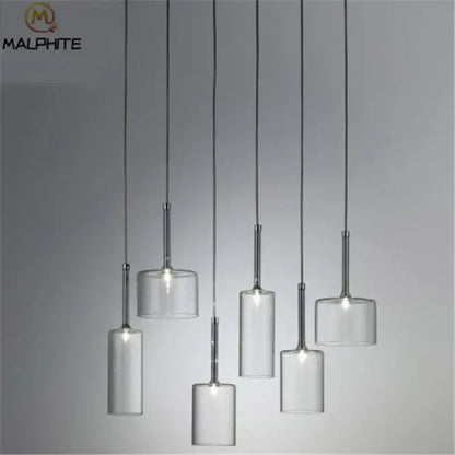 Modern chrome glass bottle pendant light with clear glass bottle shades and sleek chrome stems for dining room decorbites pendant light