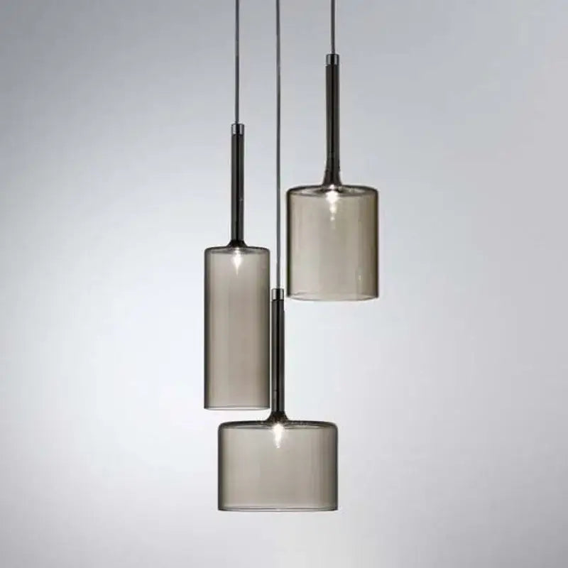 Modern chrome glass bottle pendant light with three smoked glass shades and black metal rods for dining room decorbites glass bottle