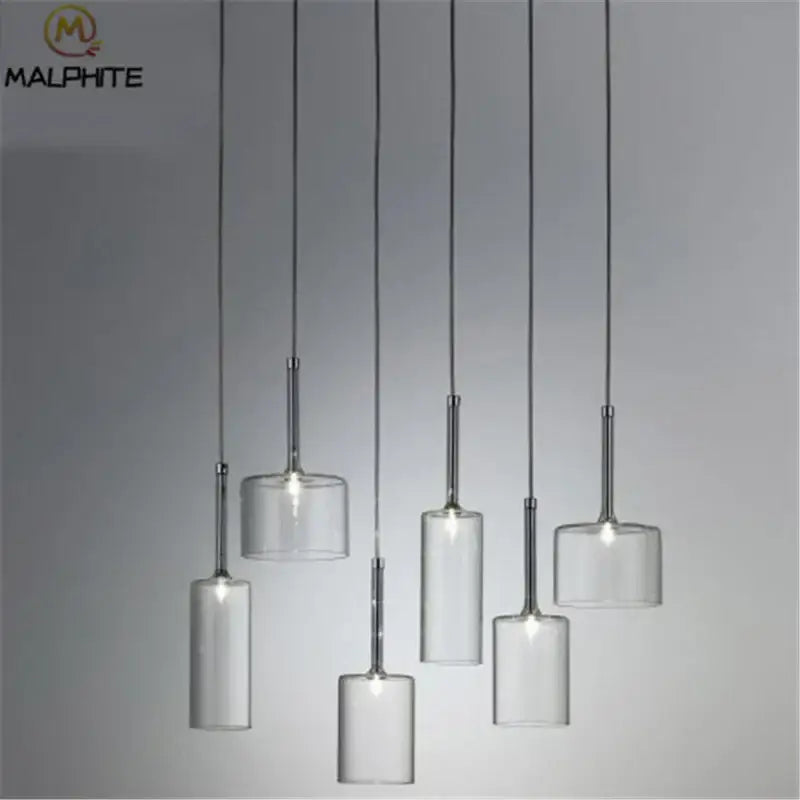 Modern chrome glass bottle pendant light with clear glass cylindrical shades and sleek chrome stems for dining room decorbites glass bottle pendant