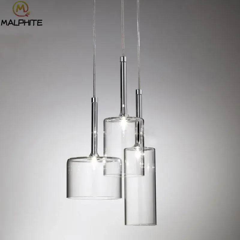 Modern chrome glass bottle pendant light with clear cylindrical glass shades and sleek metal stems for dining room decorbites glass bottle pendant design by malphite
