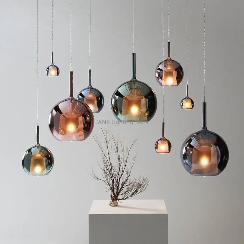 Modern chrome decorbites glass bubble pendant lights in copper rose gold and dark gray finishes for dining room chandelier
