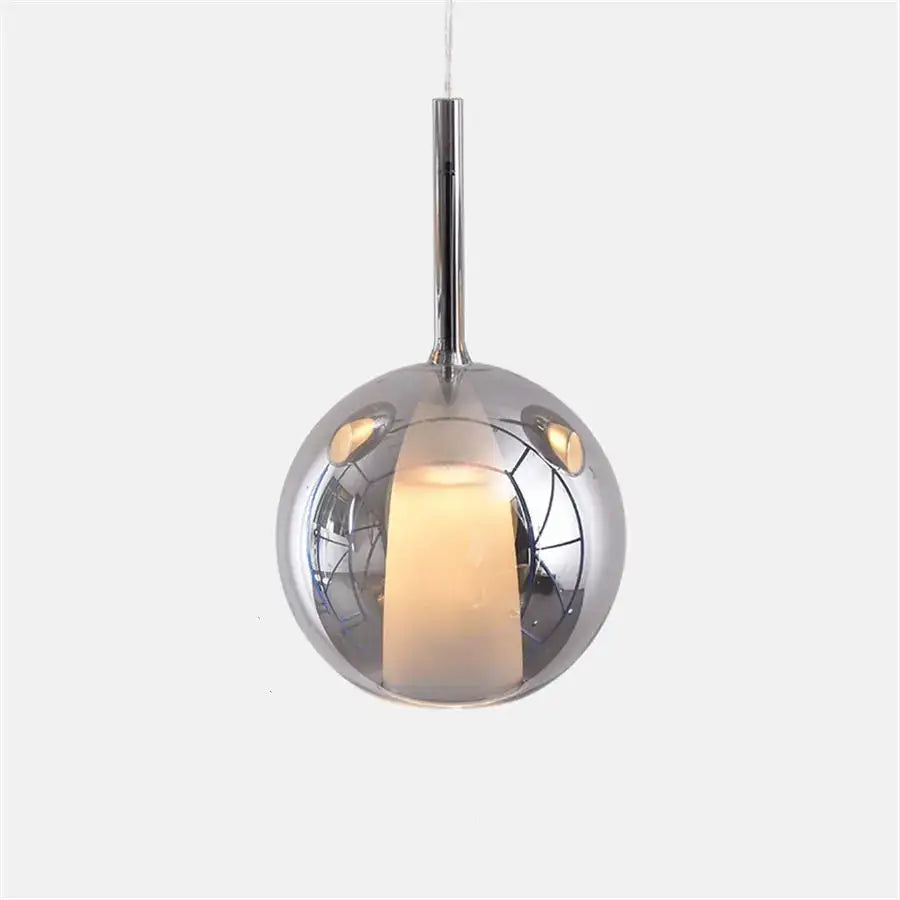 Modern chrome glass bubble pendant light with reflective glass globe and internal lighting for dining room decorbites