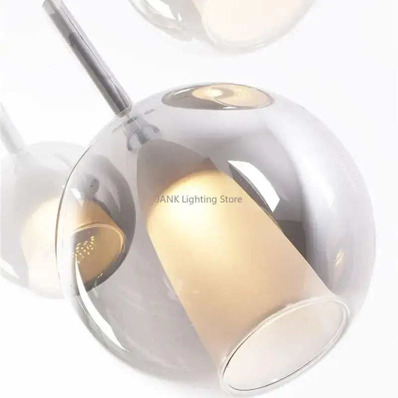 Modern chrome glass bubble pendant light with frosted glass shade and visible LED bulb for dining room decorbites pendant lights