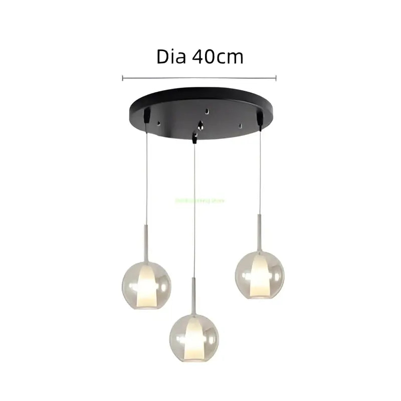 Black circular ceiling fixture with three hanging glass bubble pendant lights for modern dining room decorbites chandelier