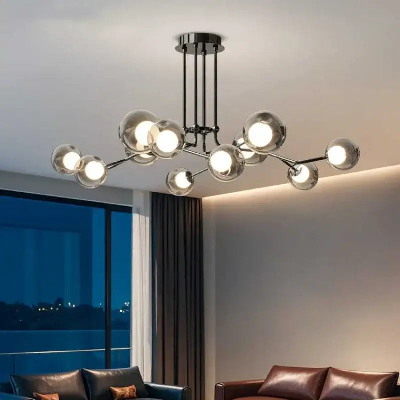 Modern chrome glass globe chandelier with multiple warm light spherical globes for dining room branching light use