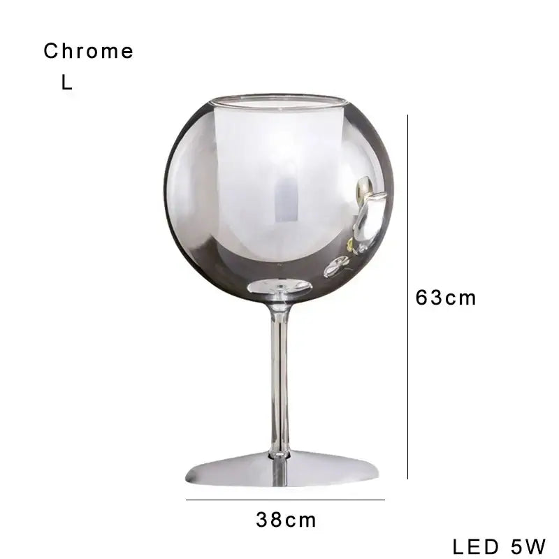 Modern chrome glass gold table lamp with a sleek reflective surface and slender stem ideal for living room decorbites glass gold