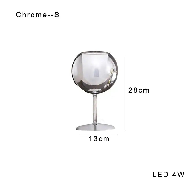 Modern chrome glass gold table lamp with sleek reflective surface and slender stem for luxury living room decorbites glass gold