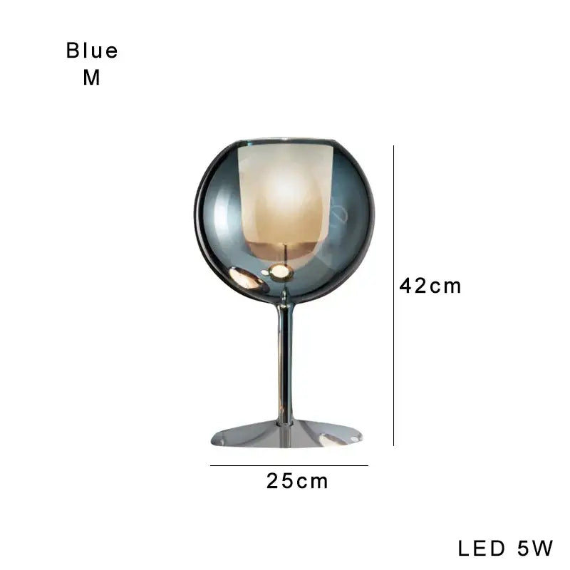 Modern chrome glass gold table lamp with translucent blue globe and chrome stem for living room decorbites glass gold glow