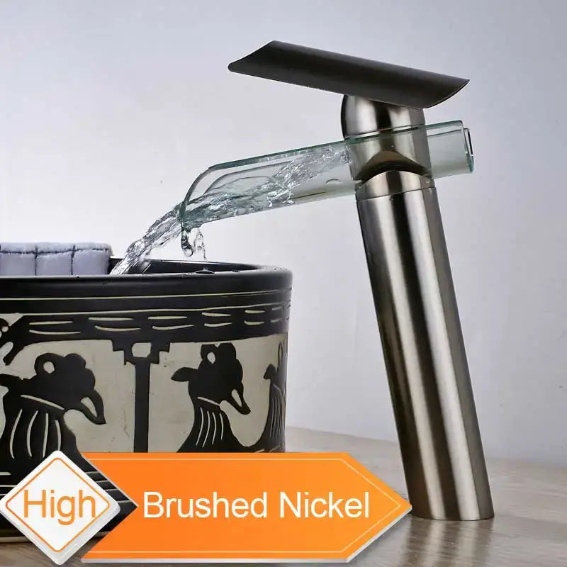 Modern chrome glass spout basin faucet with brushed nickel finish and transparent glass waterfall stream design