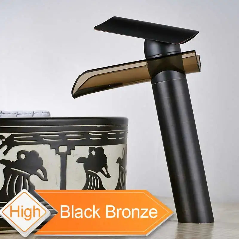 Black bronze basin faucet with sleek modern design and translucent amber glass spout for bathroom use