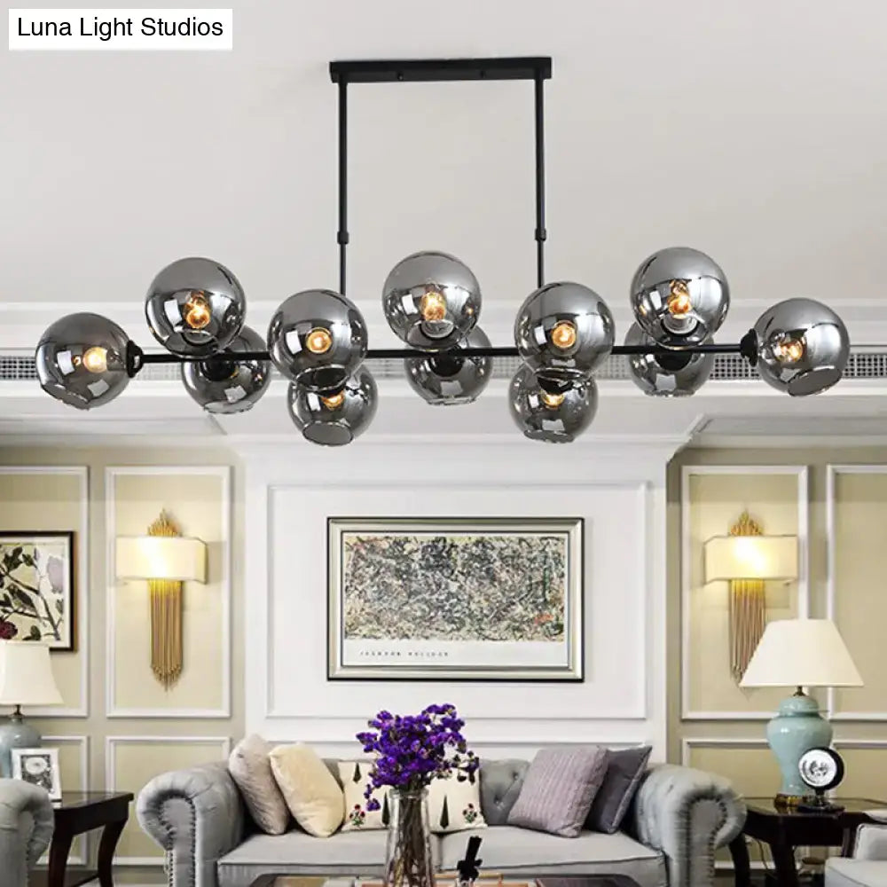DecorBites modern black island lighting with chrome spherical hanging lamp and sleek metal frame for living room use