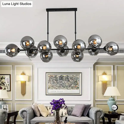 DecorBites modern black island lighting with chrome spherical hanging lamp and sleek metal frame for living room use