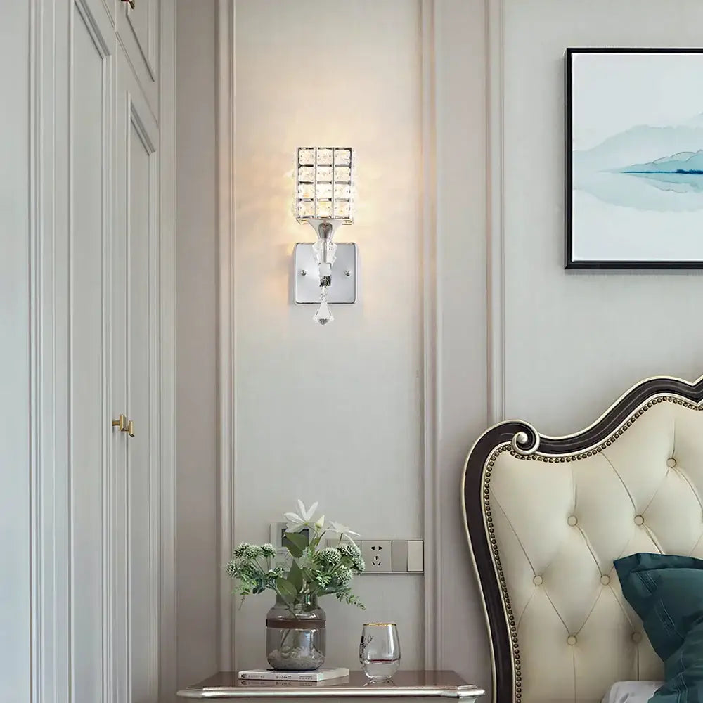 Modern chrome and gold crystal led wall light with sleek silver base and dangling crystal drop for living room decorbites crystal led wall light