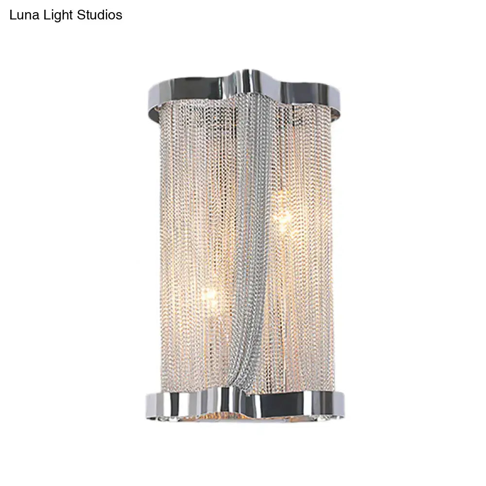 Modern chrome wall lamp with cascading silver chain mesh and sleek design ideal for bedroom use in set of 2