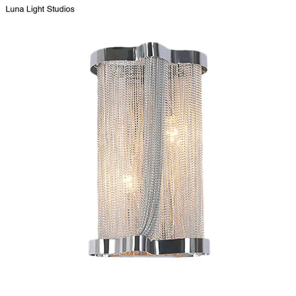 Modern chrome wall lamp with cascading silver chain mesh and sleek design ideal for bedroom use in set of 2