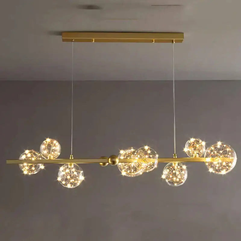 Modern chrome and gold decorbites crystal chandelier with spherical glass globes and warm fairy lights for living room light