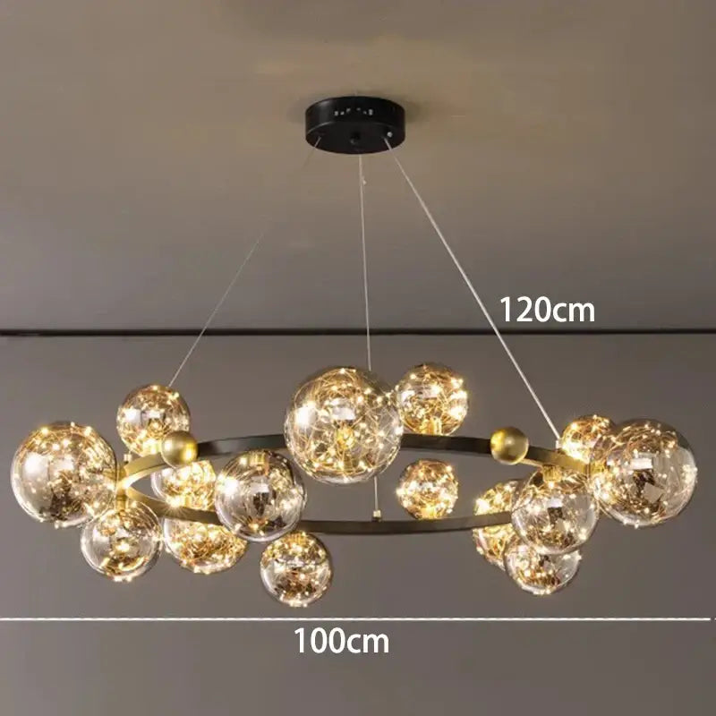Modern chrome and gold decorbites crystal chandelier with clear glass spheres and intricate internal lighting for living room