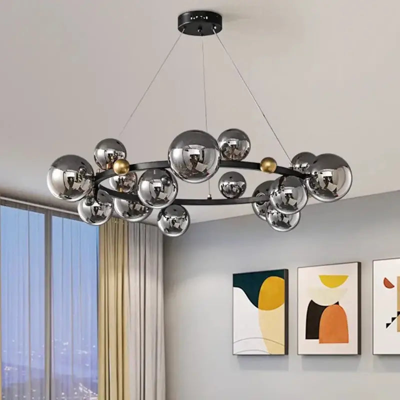 Modern chrome and gold decorbites crystal chandelier with sleek black frame for elegant living room lighting