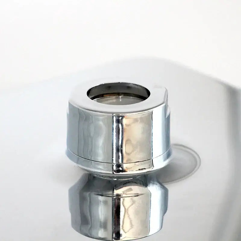 Modern chrome and gold square rainfall shower head with chrome-finished cylindrical faucet aerator and polished edges