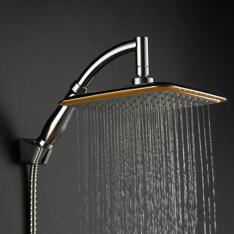 Modern chrome and gold decorbites 20cm square rainfall shower head with sleek rectangular design and gold-accented edge