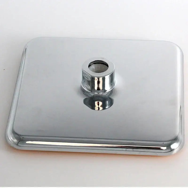 Modern chrome and gold square rainfall shower head with chrome-finished base and central cylindrical mounting hole decorbites 20cm square
