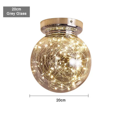 Modern chrome decorbites gypsophila led ceiling light with grey glass globe and polished brass mounting base for bedroom decor