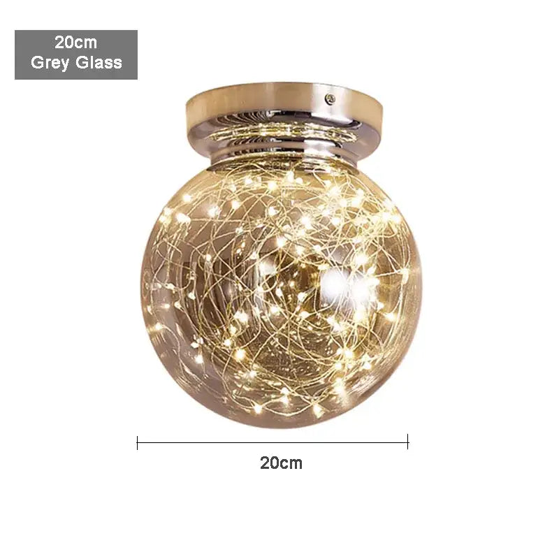 Modern chrome decorbites gypsophila led ceiling light with grey glass globe and polished brass mounting base for bedroom decor