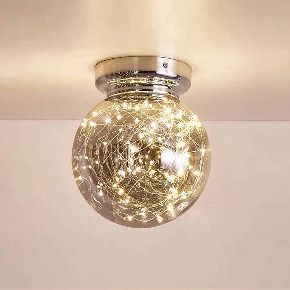 Modern chrome gypsophila led ceiling light with a glass globe and warm white fairy lights for bedroom decorbites gypsophila led