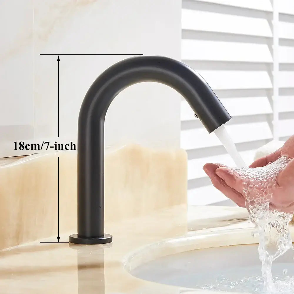 Black matte finish modern sensor faucet with curved spout and cylindrical base for bathroom with decorbites infrared sensor
