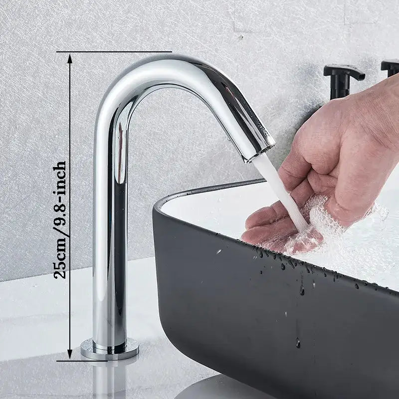 Modern chrome infrared sensor faucet with sleek curved spout and cylindrical base for bathroom touchless basin mixer