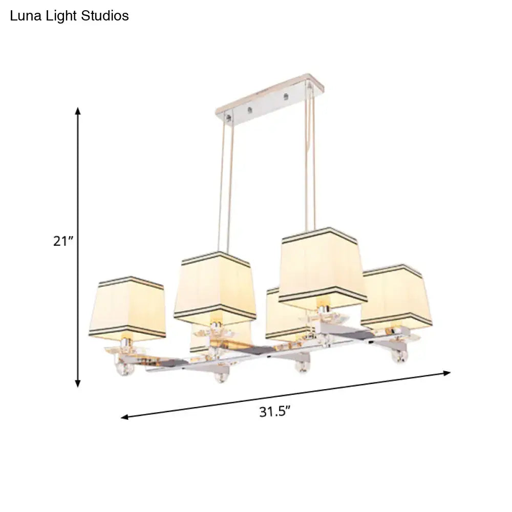 Modern chrome island pendant light with five cream square shades and black trim for dining rooms pendant light kit