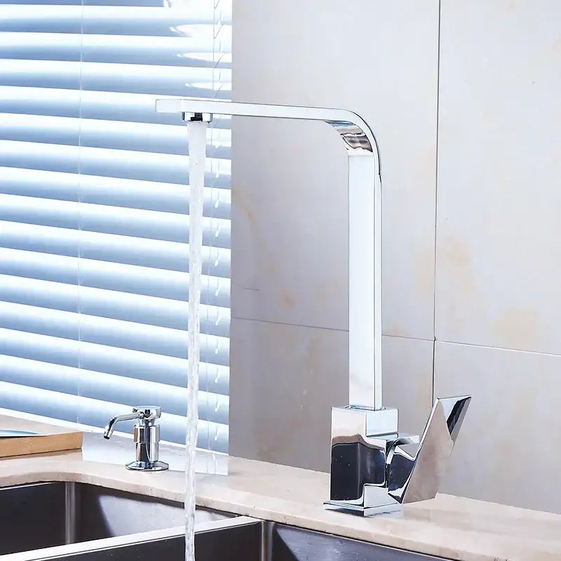 Modern chrome kitchen sink faucet with 360 swivel single handle and sleek angular waterfall spout design