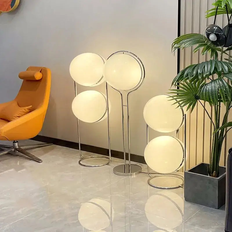 Modern chrome garrault led floor lamp with three white globe shades ideal for living room decorbites garrault led chrome