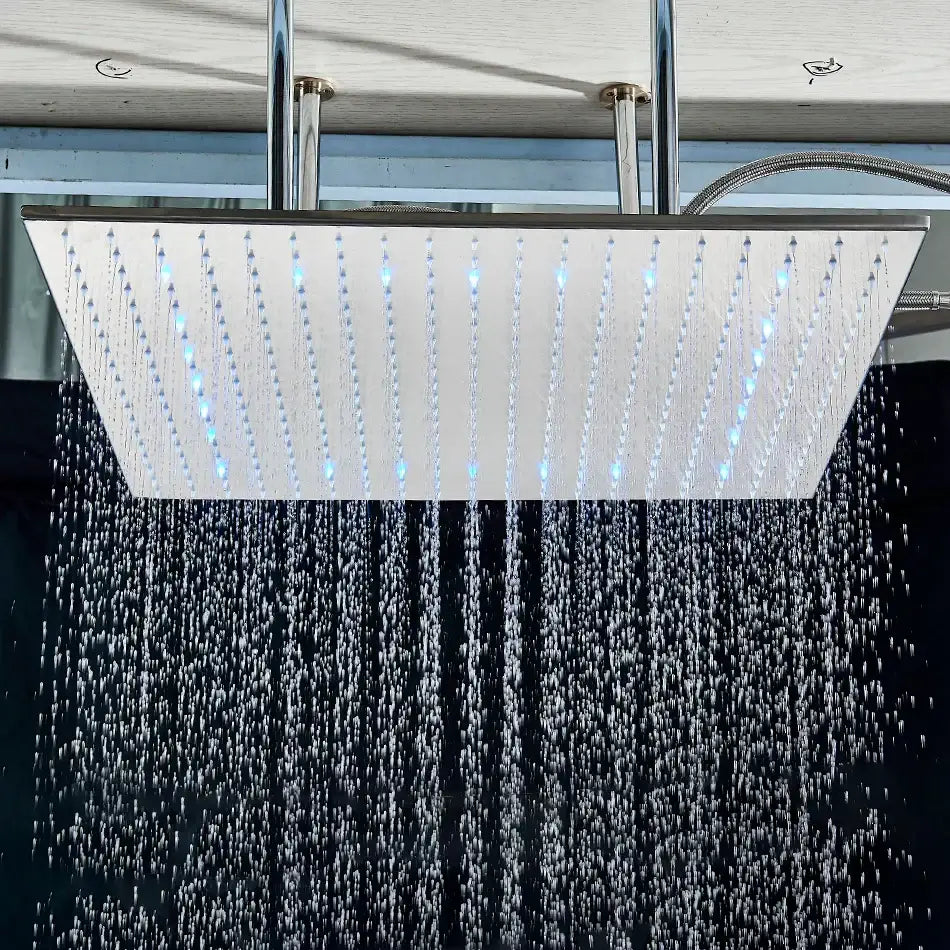Modern chrome rain shower head with sleek rectangular design and integrated blue led lighting for bathroom ceiling use