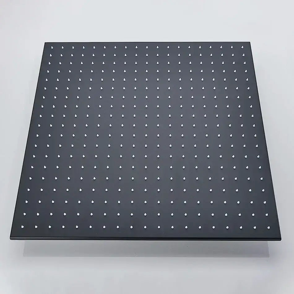 Black metal pegboard with evenly spaced white plastic holes for modern chrome rain shower head ceiling sprayer installation