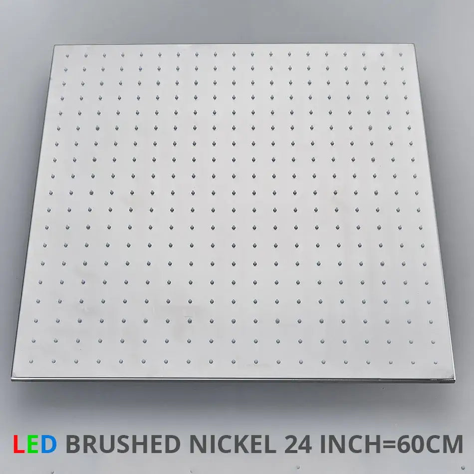 A sleek, square-shaped rain shower head with a brushed nickel finish and evenly spaced perforations for bathroom ceiling use
