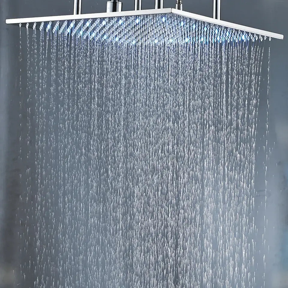 Modern chrome led rain shower head with blue embedded led lights and multiple water jets for bathroom ceiling use