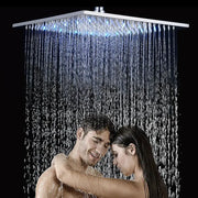 Modern chrome rainfall shower head with square chrome finish and blue led lighting multiple water streams