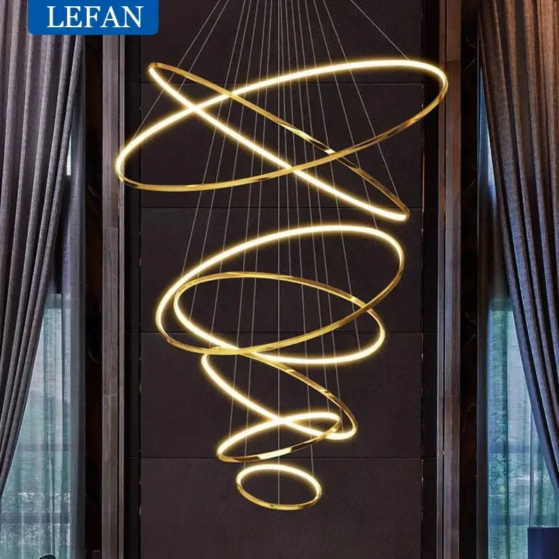 Gold-toned led spiral pendant light with modern minimalist design ideal for living room use with energy-efficient led bulbs