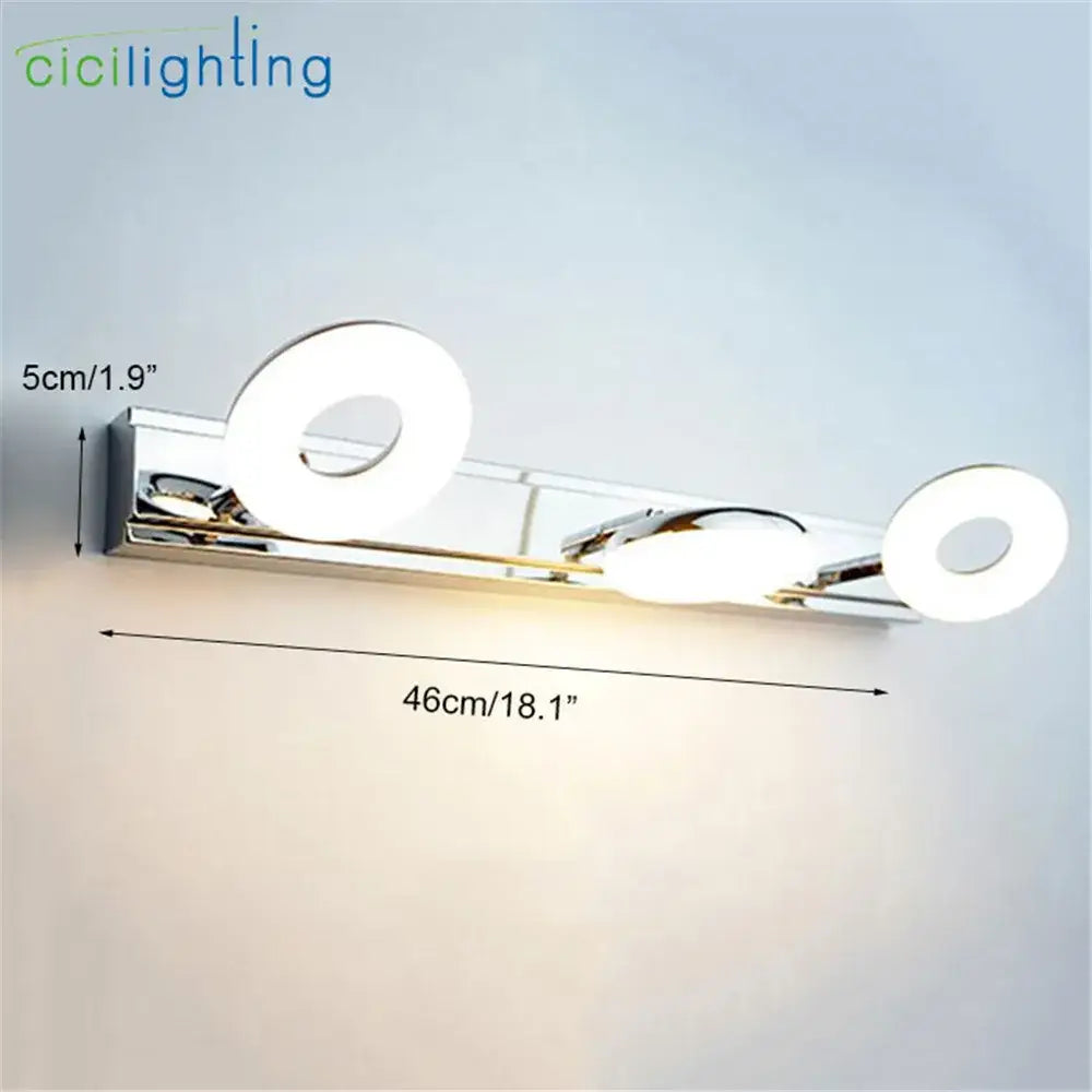 Modern chrome led vanity lamp with two circular led bulbs and sleek minimalist design for bathroom mirror lighting