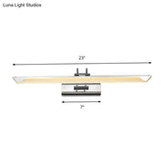 Modern chrome wall light with sleek elongated design and warm white led illumination for bathroom use