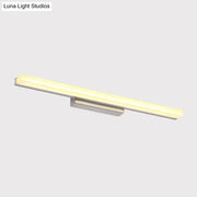 Modern chrome led wall light with streamlined metal shade in silver metal frame and warm white diffused illumination