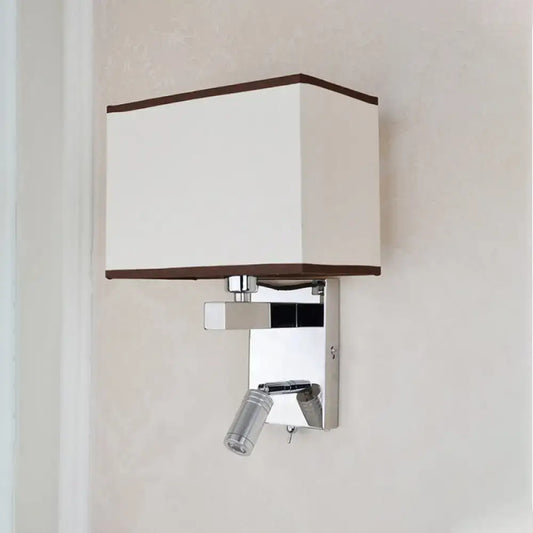 Modern chrome led wall sconce with rectangular off-white fabric shade and adjustable spotlight for bedroom reading
