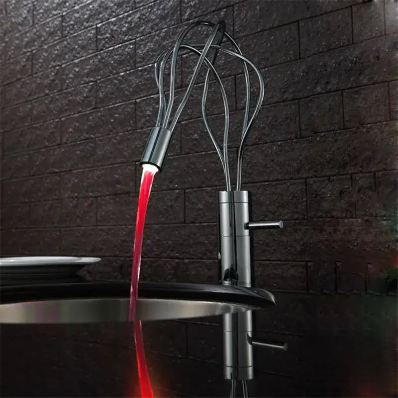 Modern chrome led waterfall bathroom faucet with metallic finish and intricate whisk-like spout decorbites led waterfall