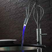 A modern chrome led waterfall bathroom faucet with a metallic finish and blue light stream for decorbites led waterfall