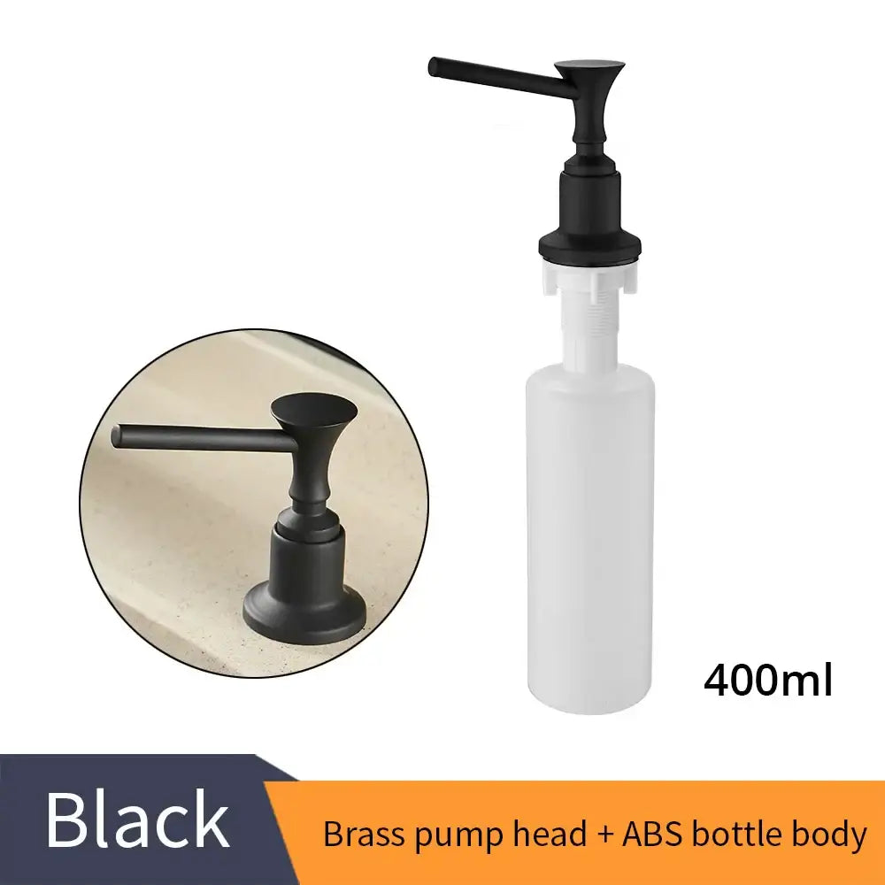 Modern chrome liquid soap dispenser with a black brass pump head and translucent white abs bottle for kitchen use