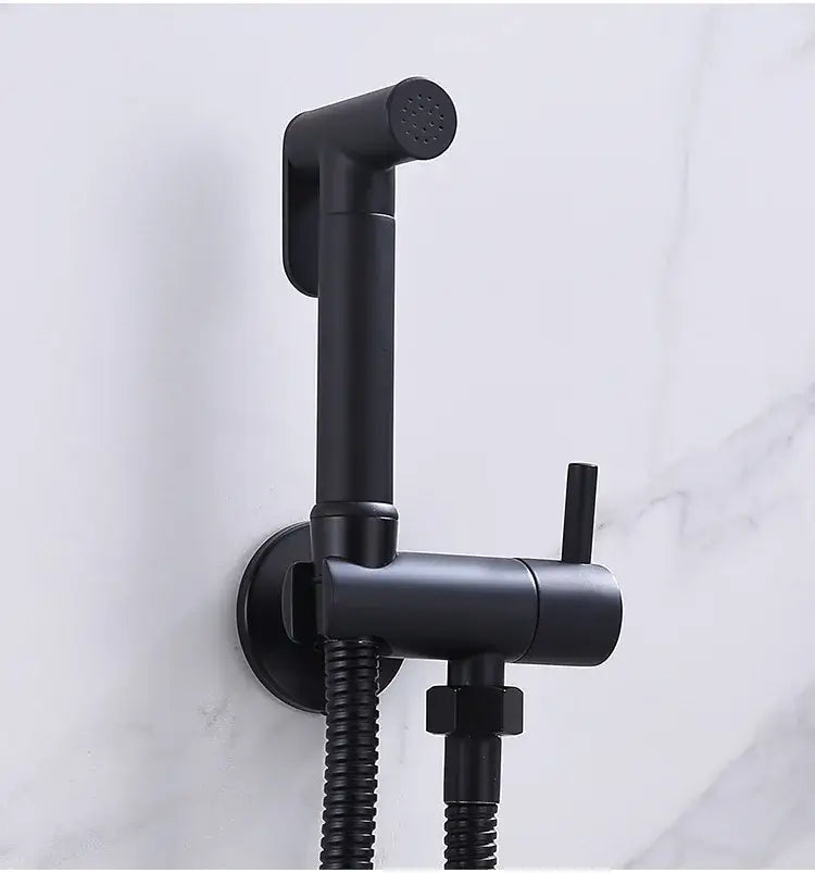 Modern chrome and matte black bidet spray set with dual control knobs and flexible hose for bathroom use