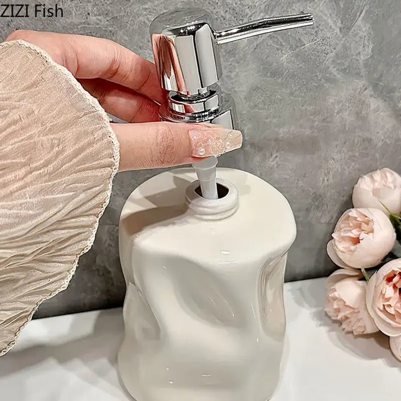 Modern chrome and matte white decorbites wrinkle ceramic soap dispenser with a sleek chrome pump for bathroom use