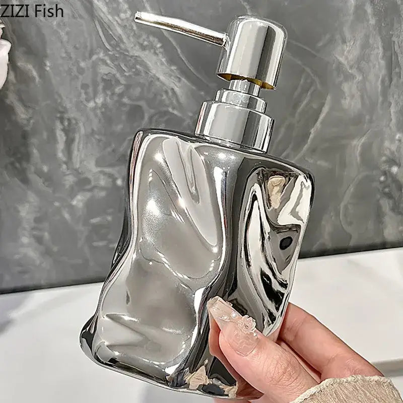 Shiny chrome-finished soap dispenser with sleek abstract body and matching pump from decorbites wrinkle ceramic set bathroom
